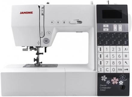 Швейна машина Janome DC 7060